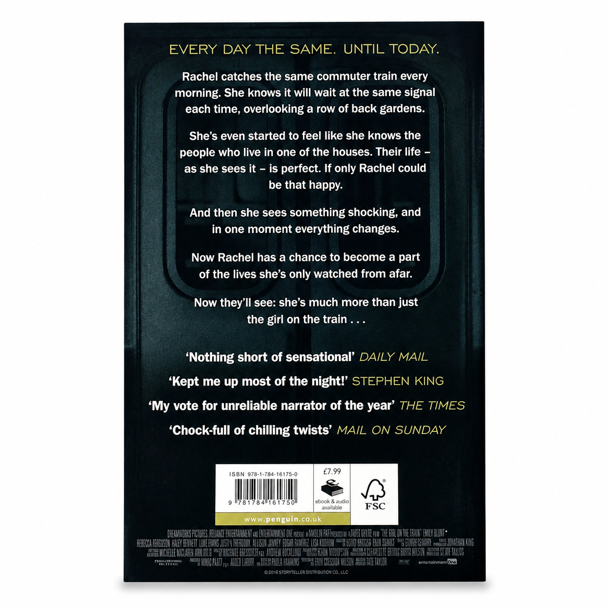 Back cover of The Girl on the Train by Paula Hawkins paperback showing the book synopsis and ISBN.