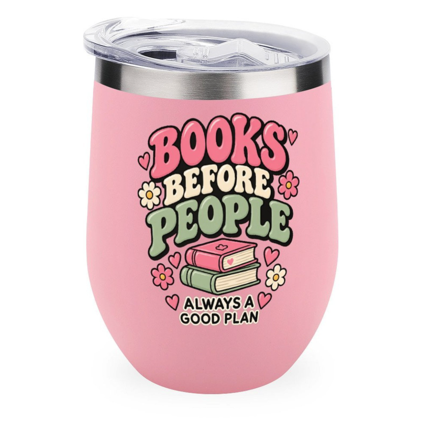 A pink insulated stemless tumbler with a clear lid and a graphic that reads 'BOOKS BEFORE PEOPLE ALWAYS A GOOD PLAN' with flowers, hearts, and a stack of books, shown on a white background.
