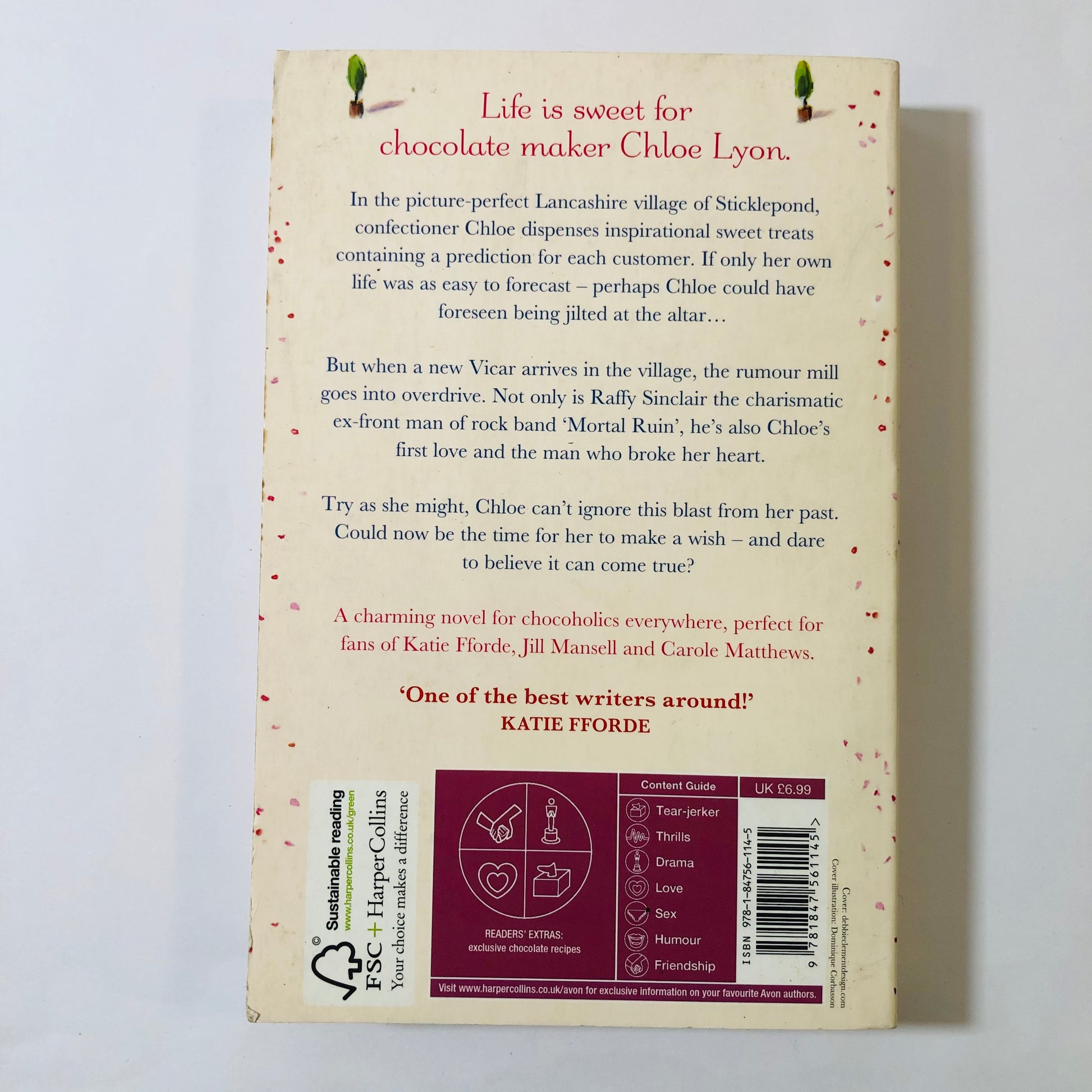 Back cover of a book with text and a barcode on a white background