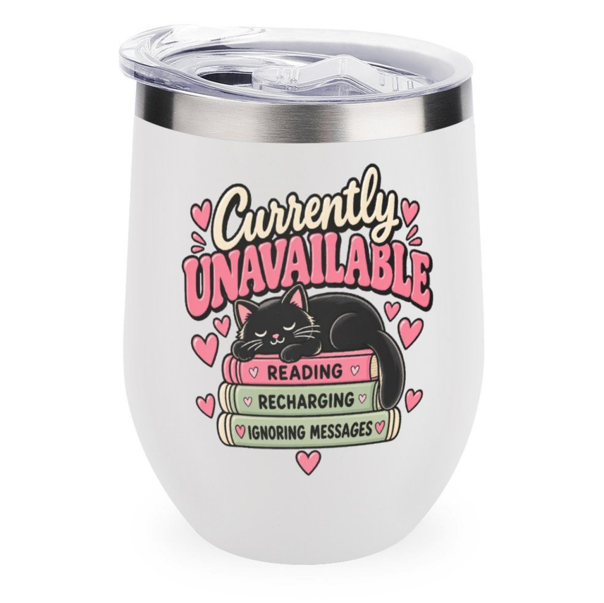 A white insulated stemless tumbler with a clear lid, featuring a graphic of a black cat resting on pink and green books with the text 'Currently UNAVAILABLE' and small pink hearts.