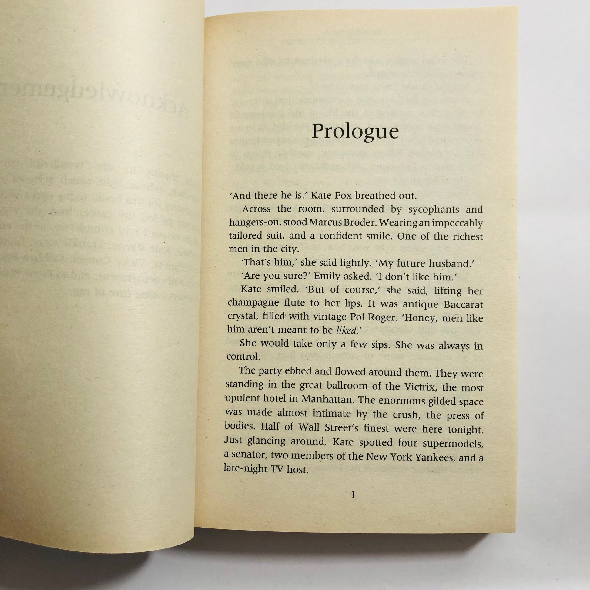 Open book showing a prologue with text on a white background