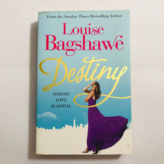 Book cover of 'Destiny' by Louise Bagshawe with a woman in a purple dress on a light blue background.
