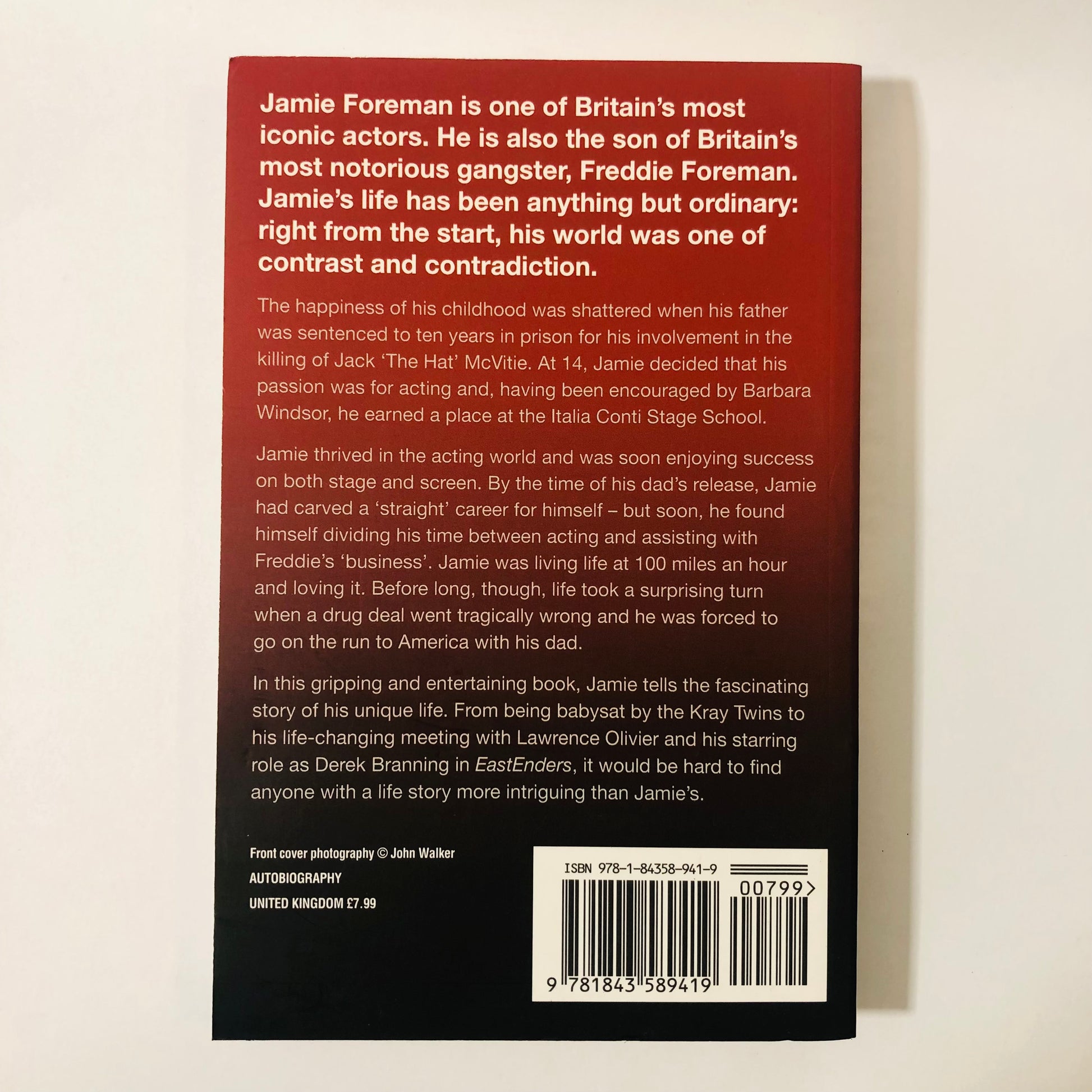 Close-up of the back cover of Gangsters, Guns and Me showing a bold quote from Jamie Foreman or praise from a known figure.