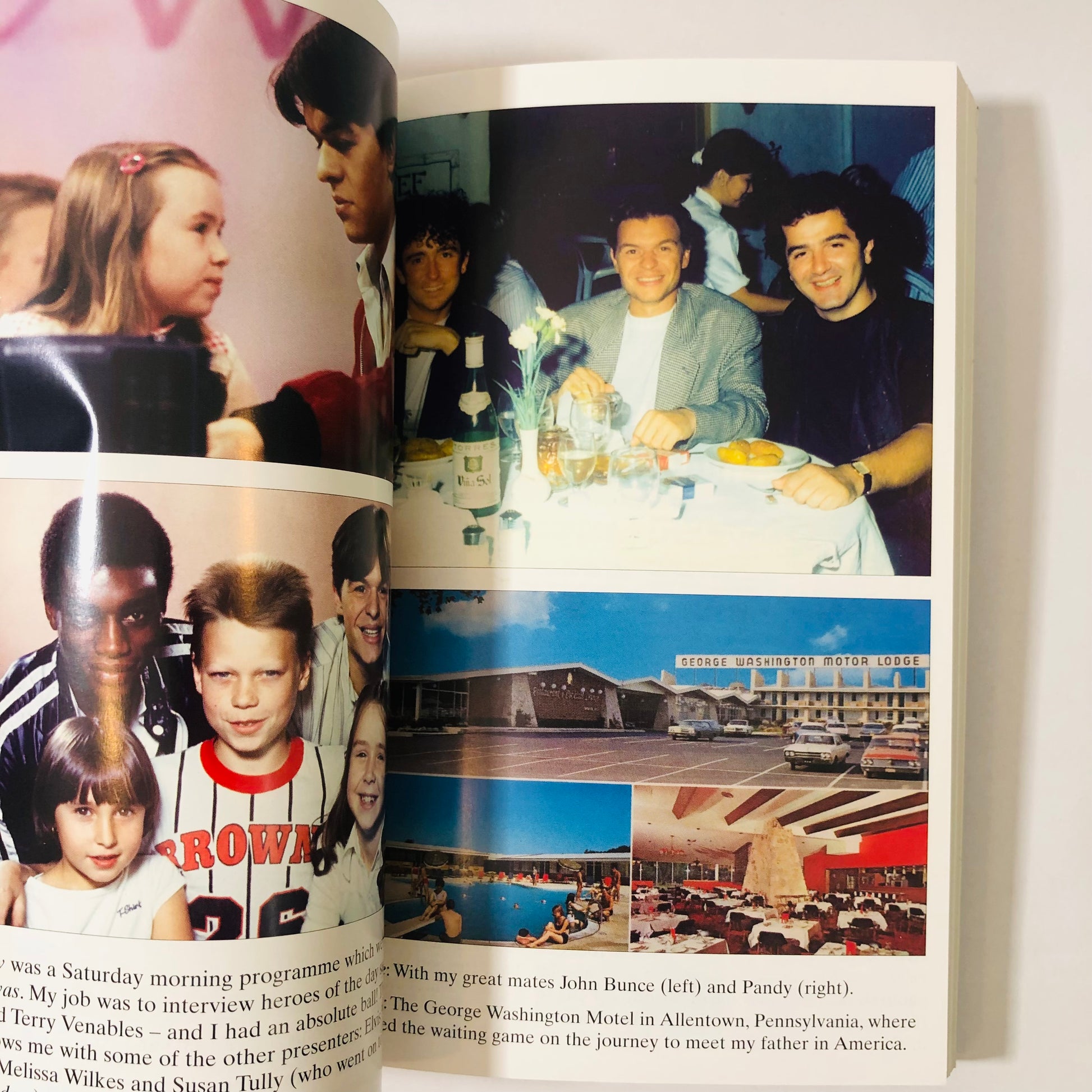 Open book with photos of people and a building on a white background