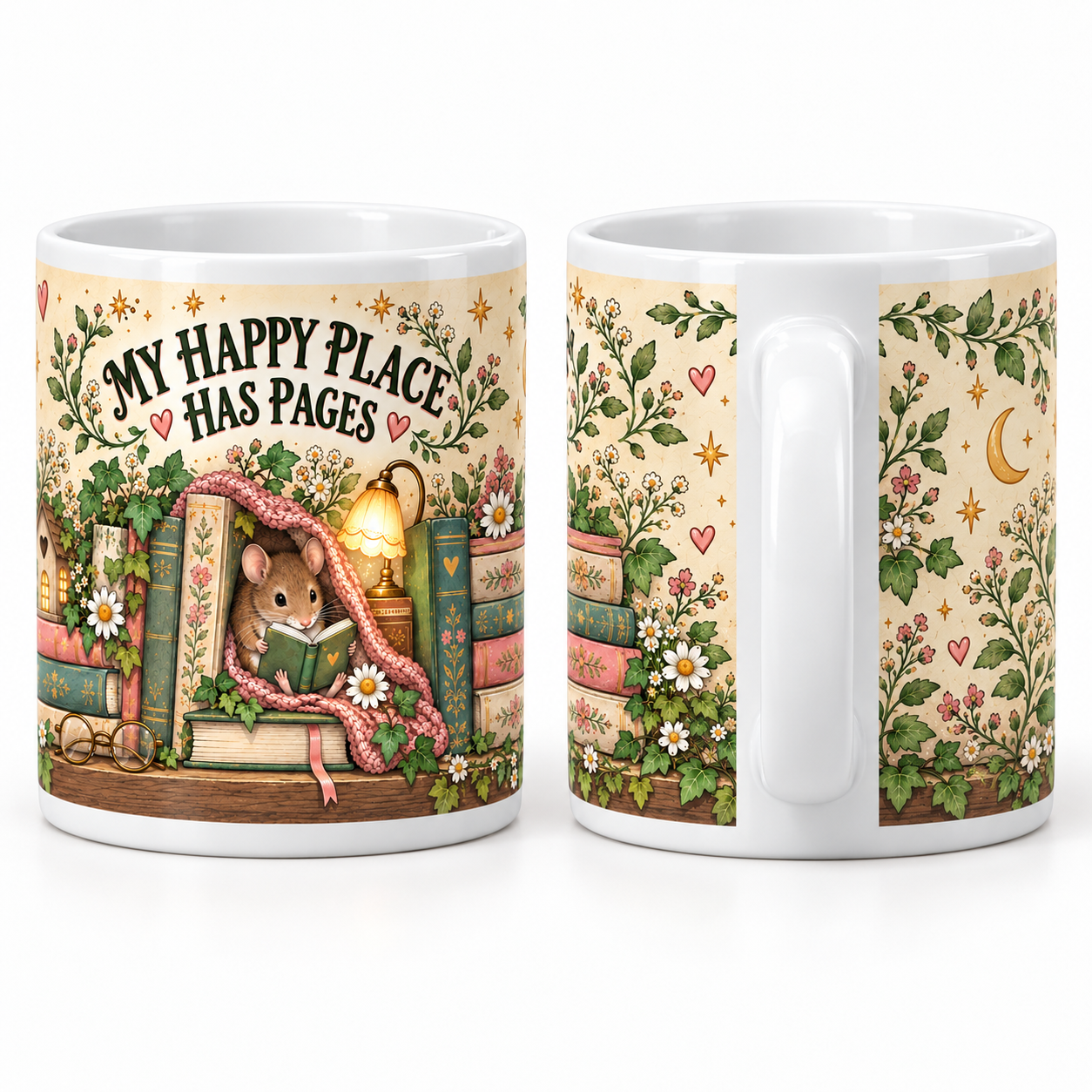 Two white ceramic mugs shown on a clean white background, displaying the front and side views of a mug with a whimsical illustrated design. The design features a small mouse reading under a lamp next to stacks of books, framed by green leaves, pink flowers, and the text 'MY HAPPY PLACE HAS PAGES'.