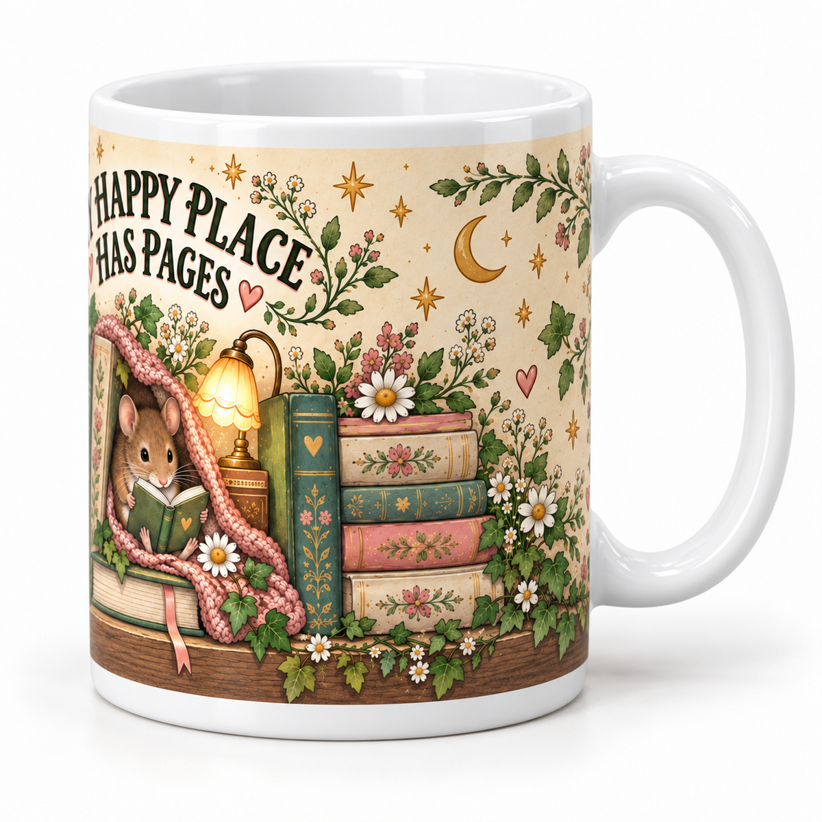 A white ceramic mug featuring a whimsical illustrated design with a mouse reading by a lamp, stacked floral books, flowers, vines, stars, and the text 'HAPPY PLACE HAS PAGES'.
