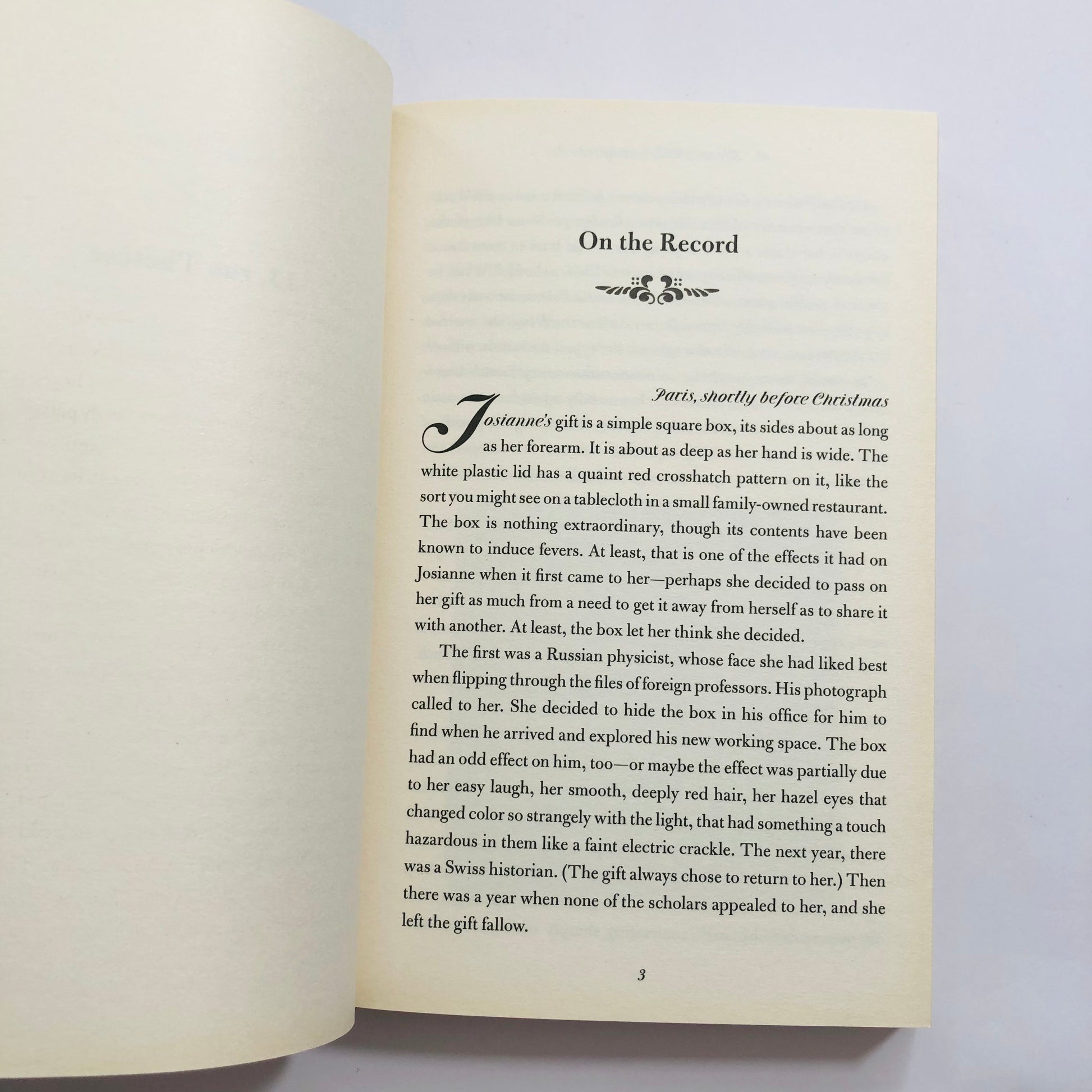 Open book with text on a white background