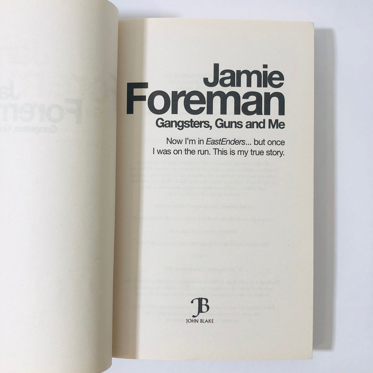 Book titled 'Gangsters, Guns and Me' by Jamie Foreman on a white background
