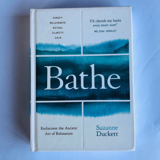Book titled 'Bathe' by Suzanne Duckett on a light blue background