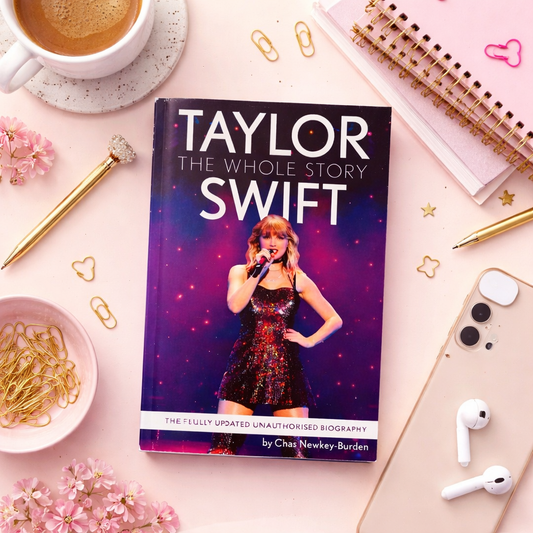 Taylor Swift the Whole Story Paperback book laid on a beauty backgrond flatlay