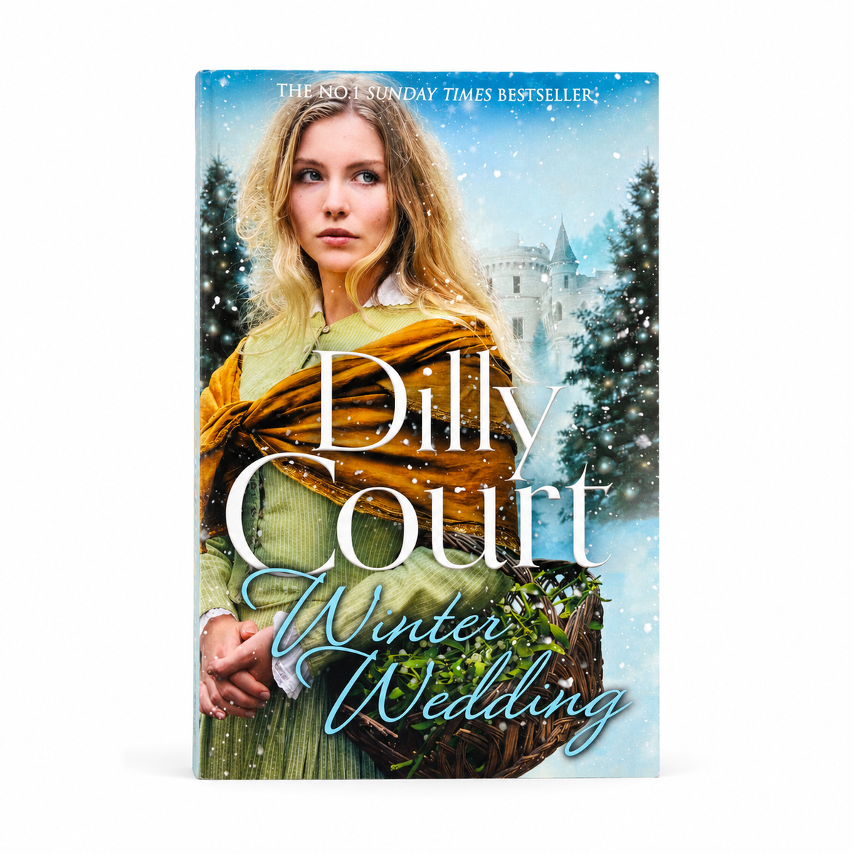 Front cover of Winter Wedding by Dilly Court, new paperback book photographed on a clean white background for the BookBuddies online bookshop.