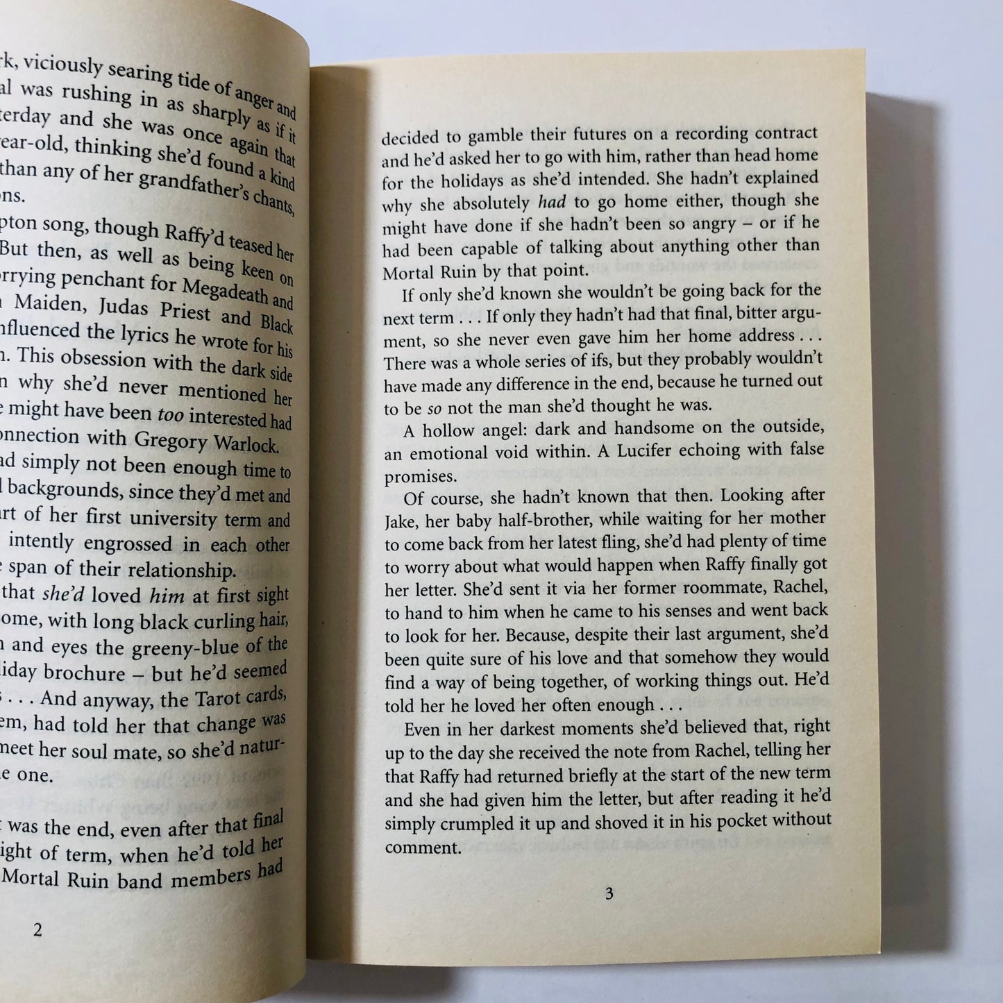 Open book with text on a white background