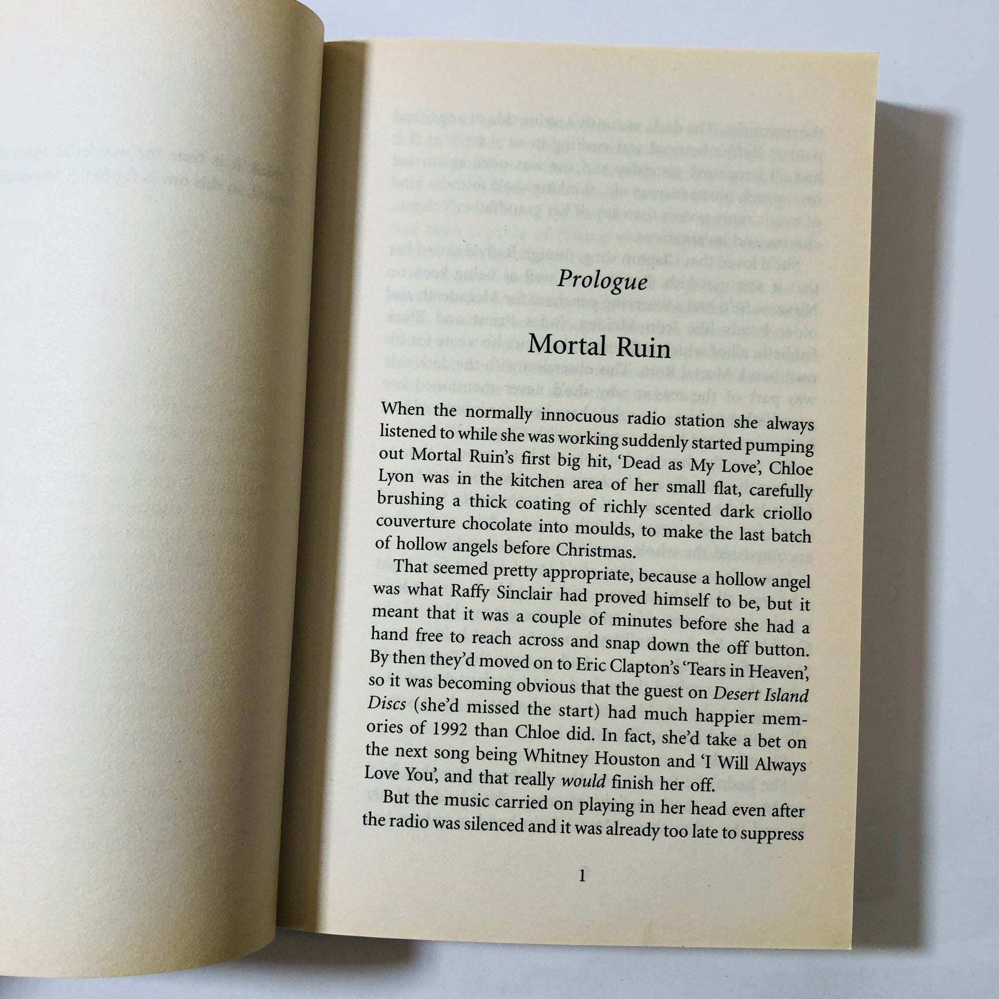 Open book with text on a white background