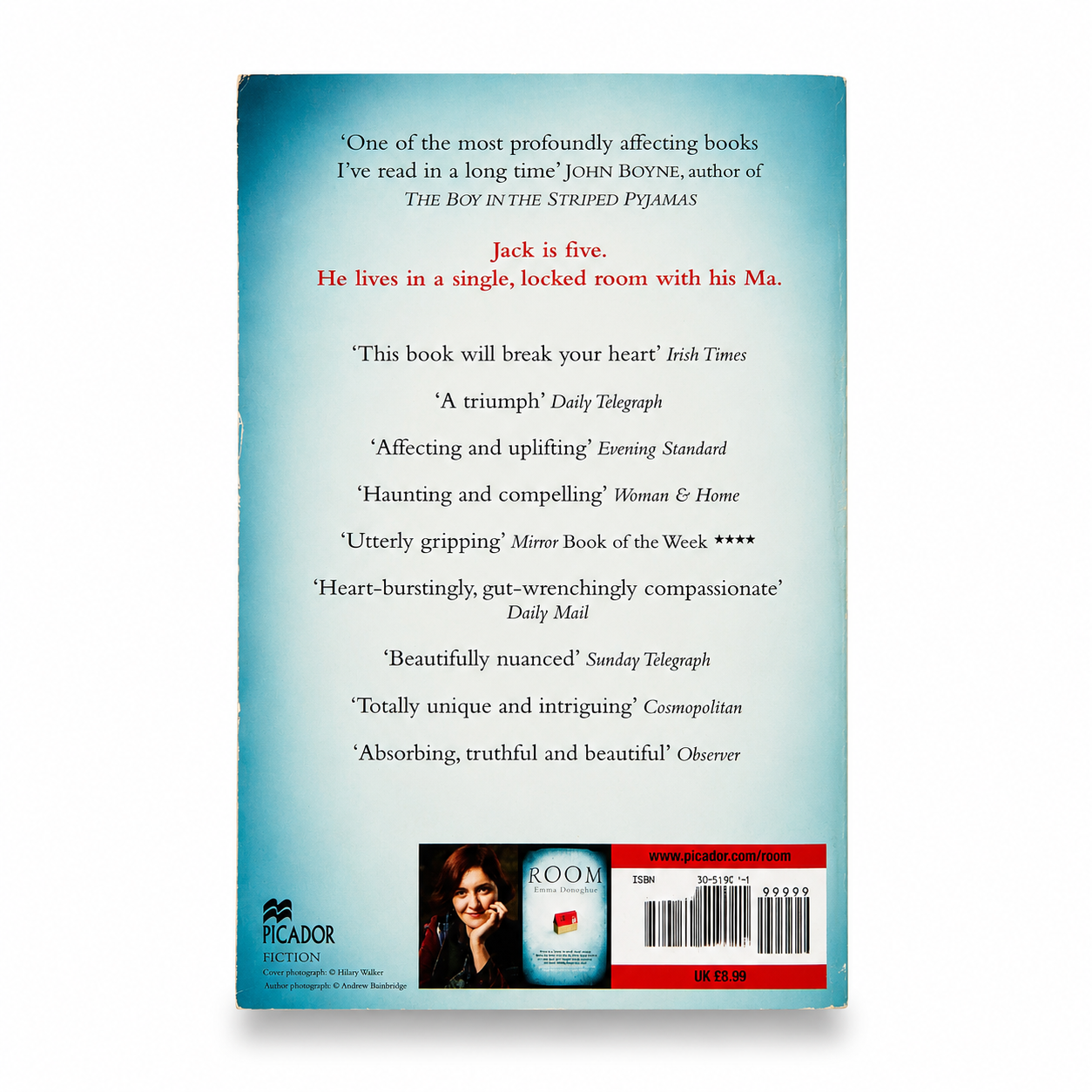 Back cover of Room by Emma Donoghue, paperback book in Very Good used condition showing the publisher's synopsis and barcode on a white background.