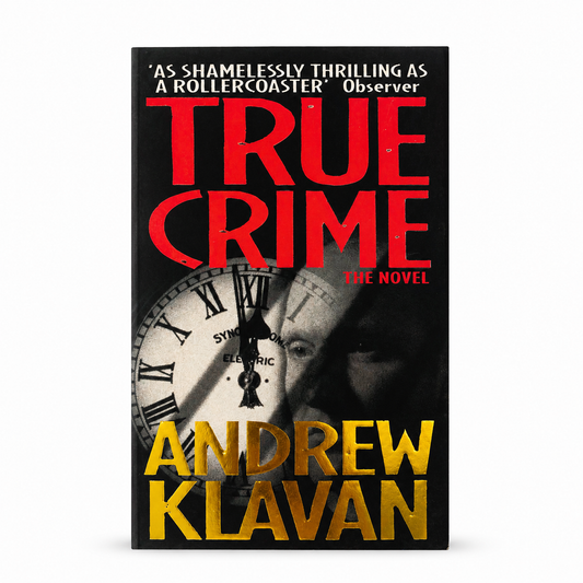 Front cover of True Crime: The Novel by Andrew Klavan, paperback psychological crime thriller in Very Good condition featuring bold red and gold typography over a dark clock and face design.